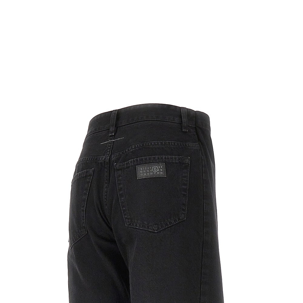 Jeans con pannelli laterali