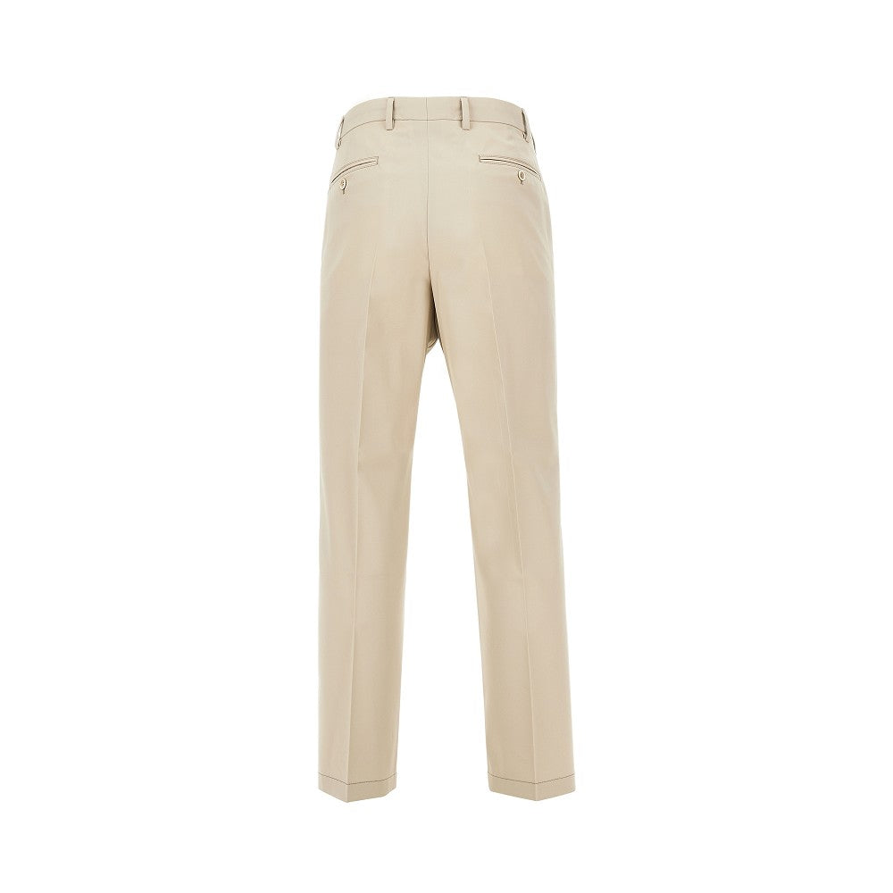 Pantalone in cotone con charm logo triangolo