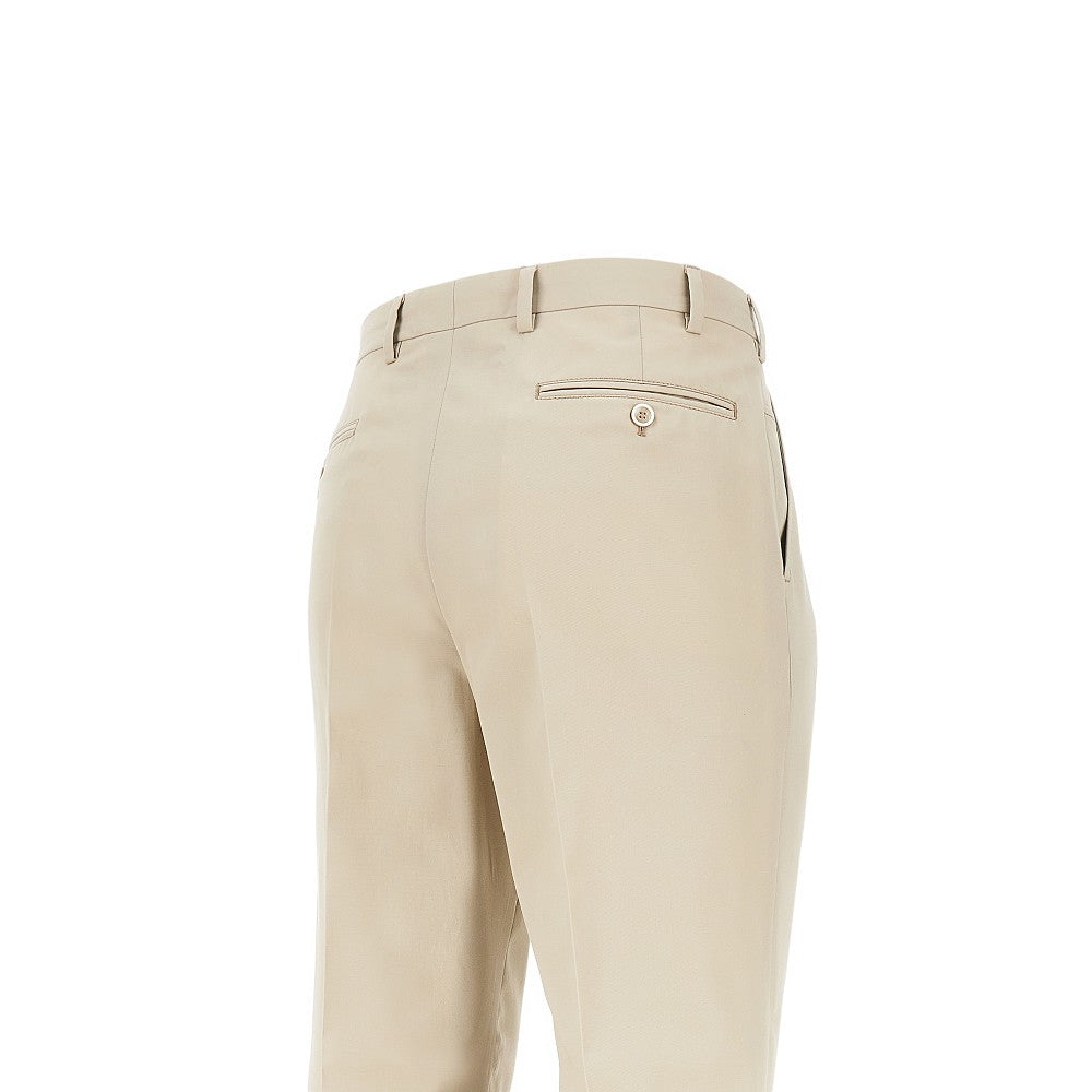 Pantalone in cotone con charm logo triangolo