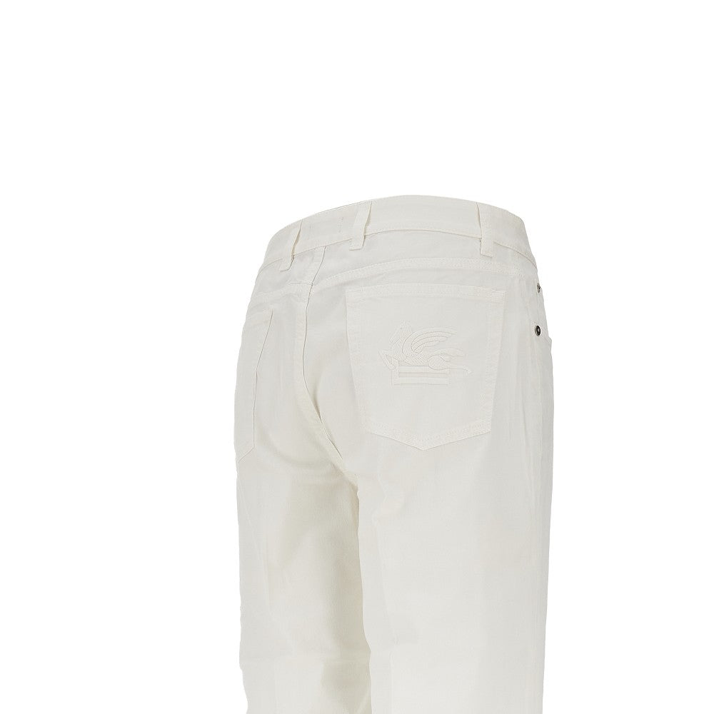 Pantalone svasato in twill stretch