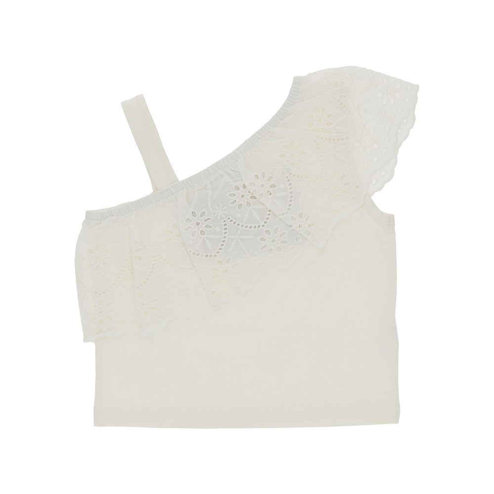 Top asimmetrico con volant