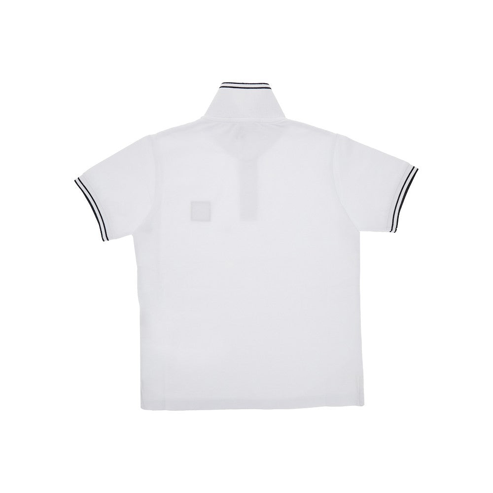 Polo in piquet stretch con patch logo