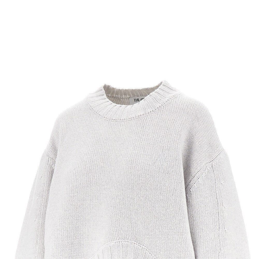 Pullover in lana con orlo sagomato