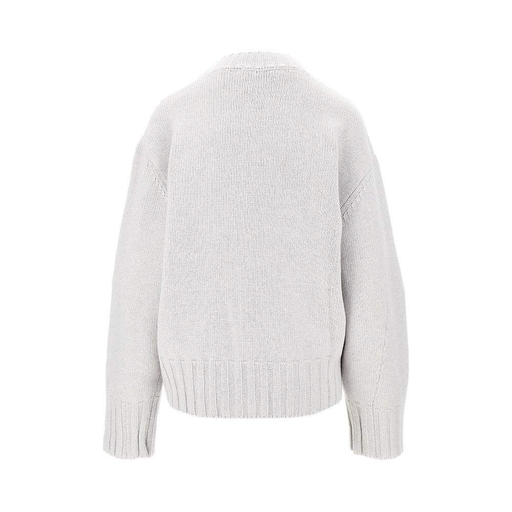 Pullover in lana con orlo sagomato