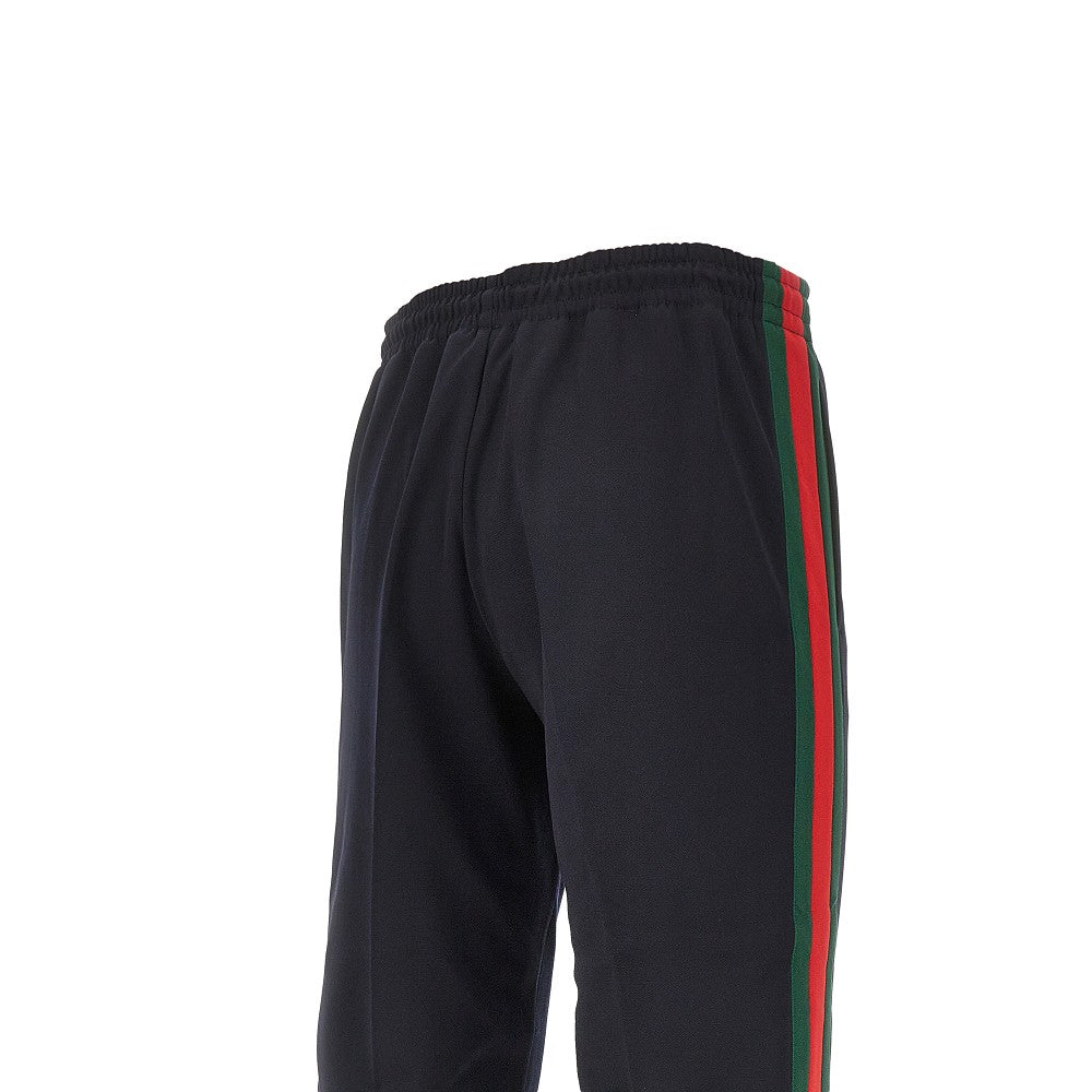Track pants in jersey tecnico con bande Web