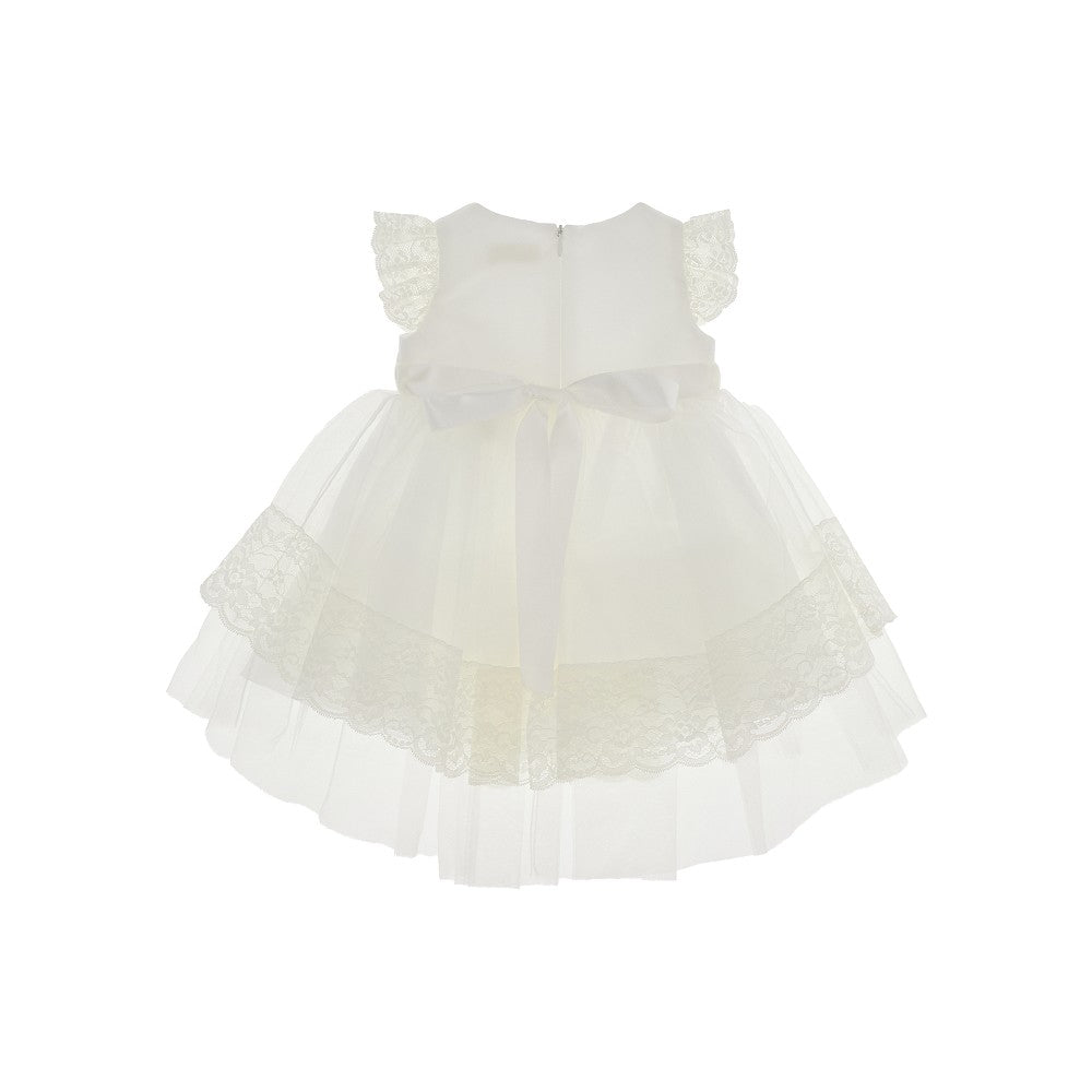 Tulle baby dress with lace and flower brooch