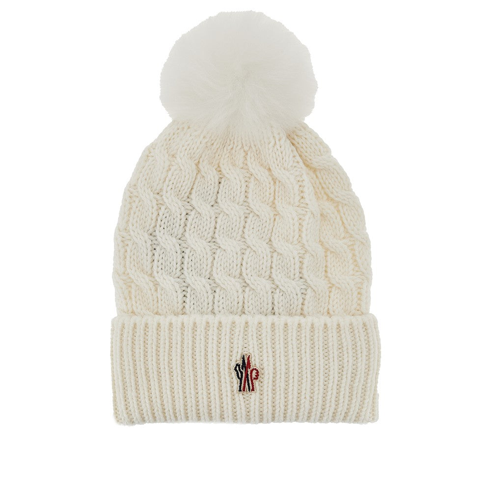 Beanie in lana con pompon in pelliccia