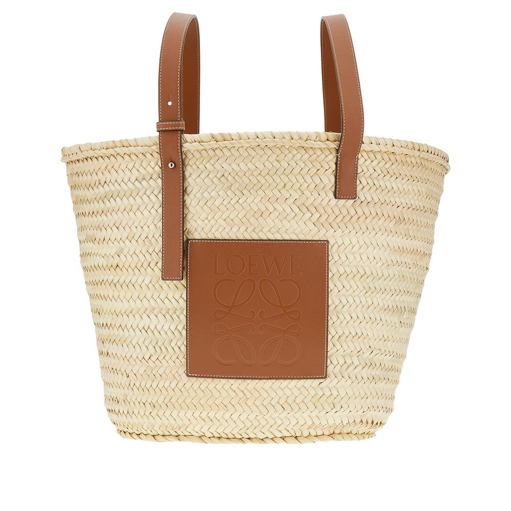 Large basket bag in palm leaf and leather