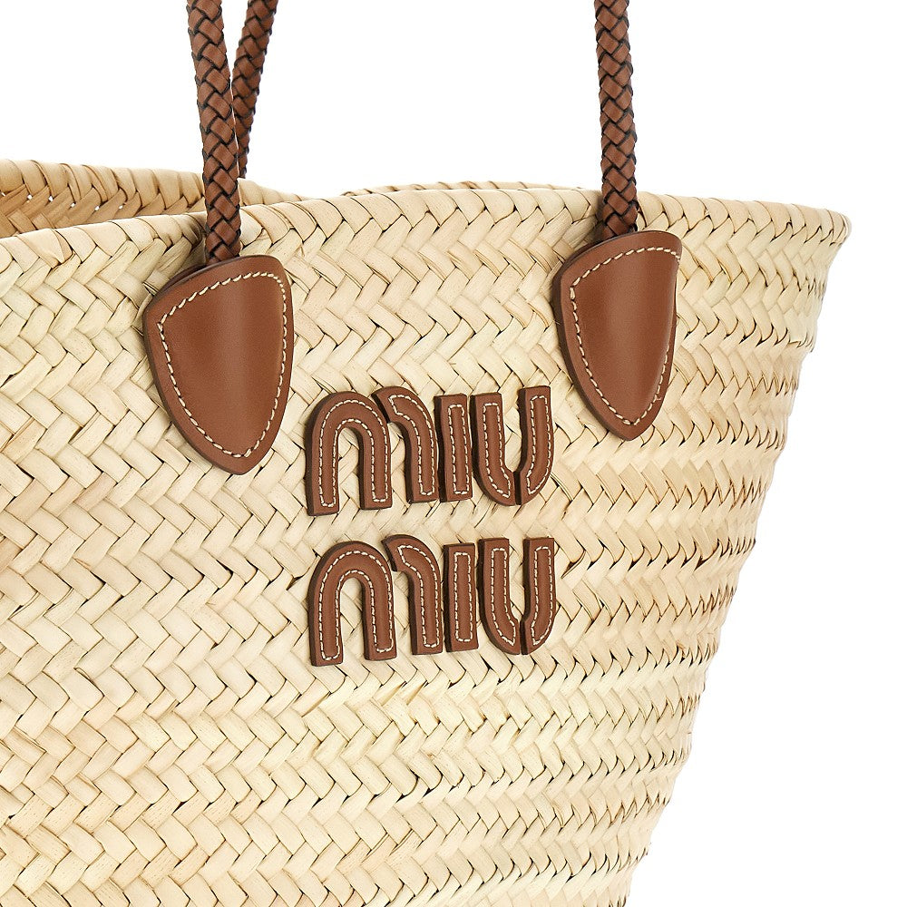 Leather and palm leafs basket bag