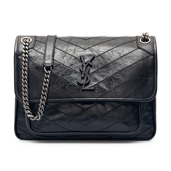 Borsa Niki media in pelle increspata