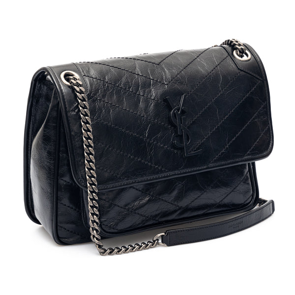 Borsa Niki media in pelle increspata