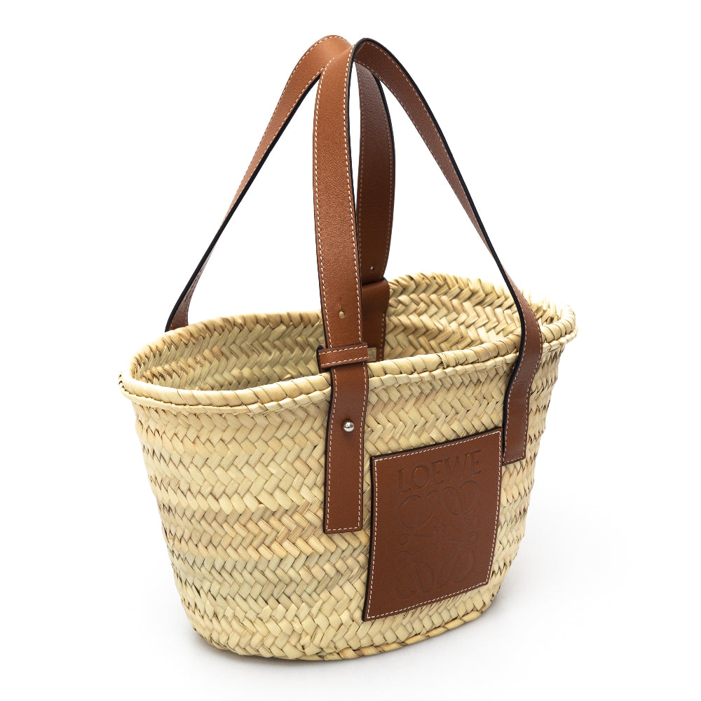 Small basket bag in palm leaf and leather