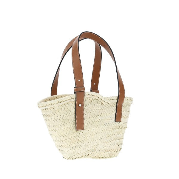 Basket bag piccola in foglie di palma e pelle