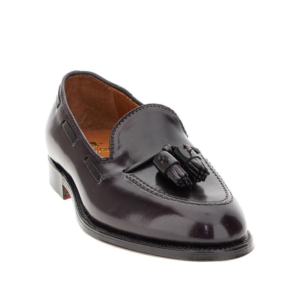 Mocassini in pelle spazzolata con nappine