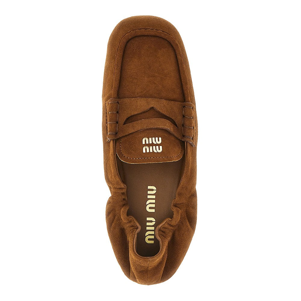 Suede leather loafers with logo