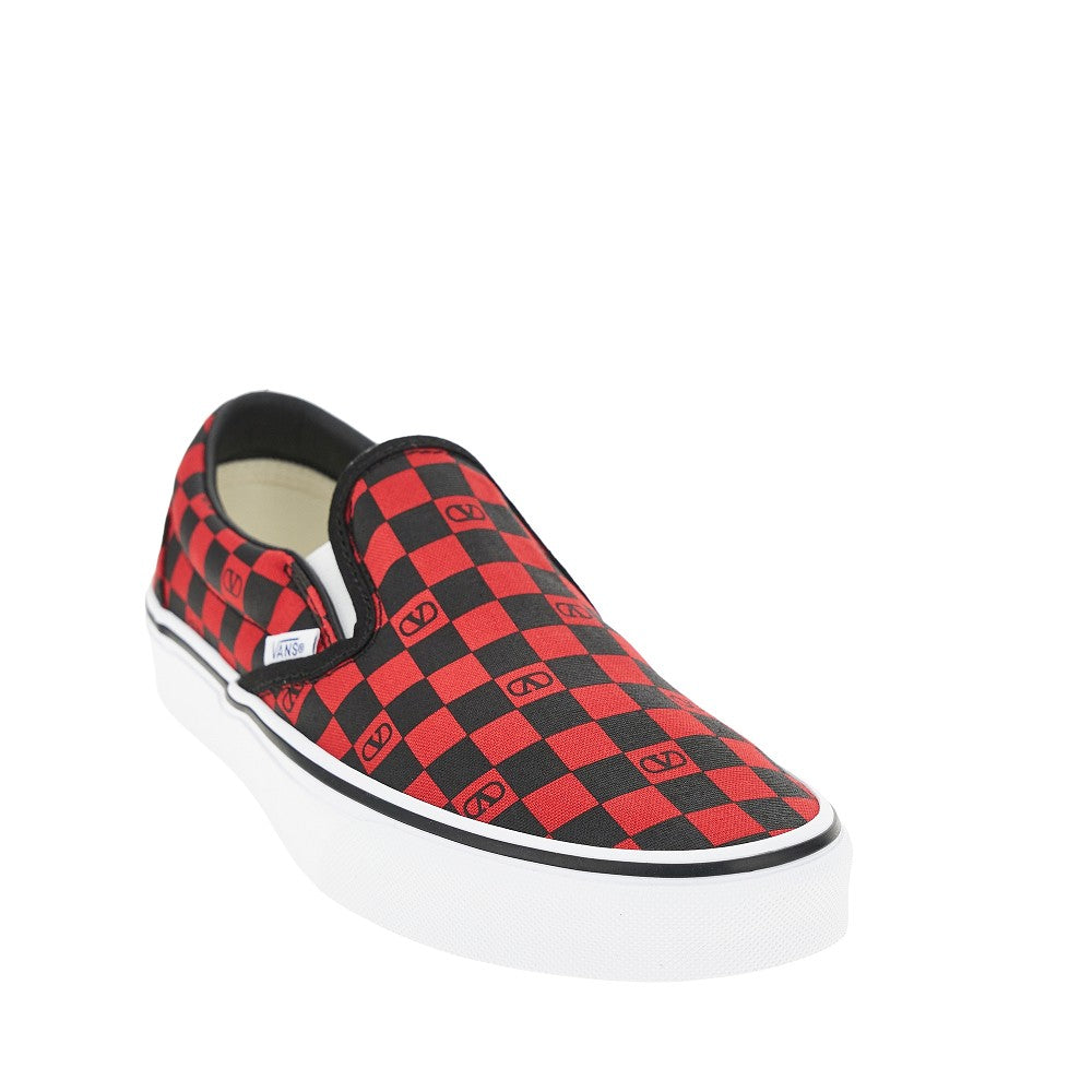 Valentino Garavani and Vans slip-on sneakers