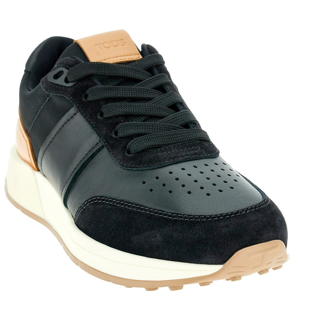 Sneakers in pelle e tessuto tecnico
