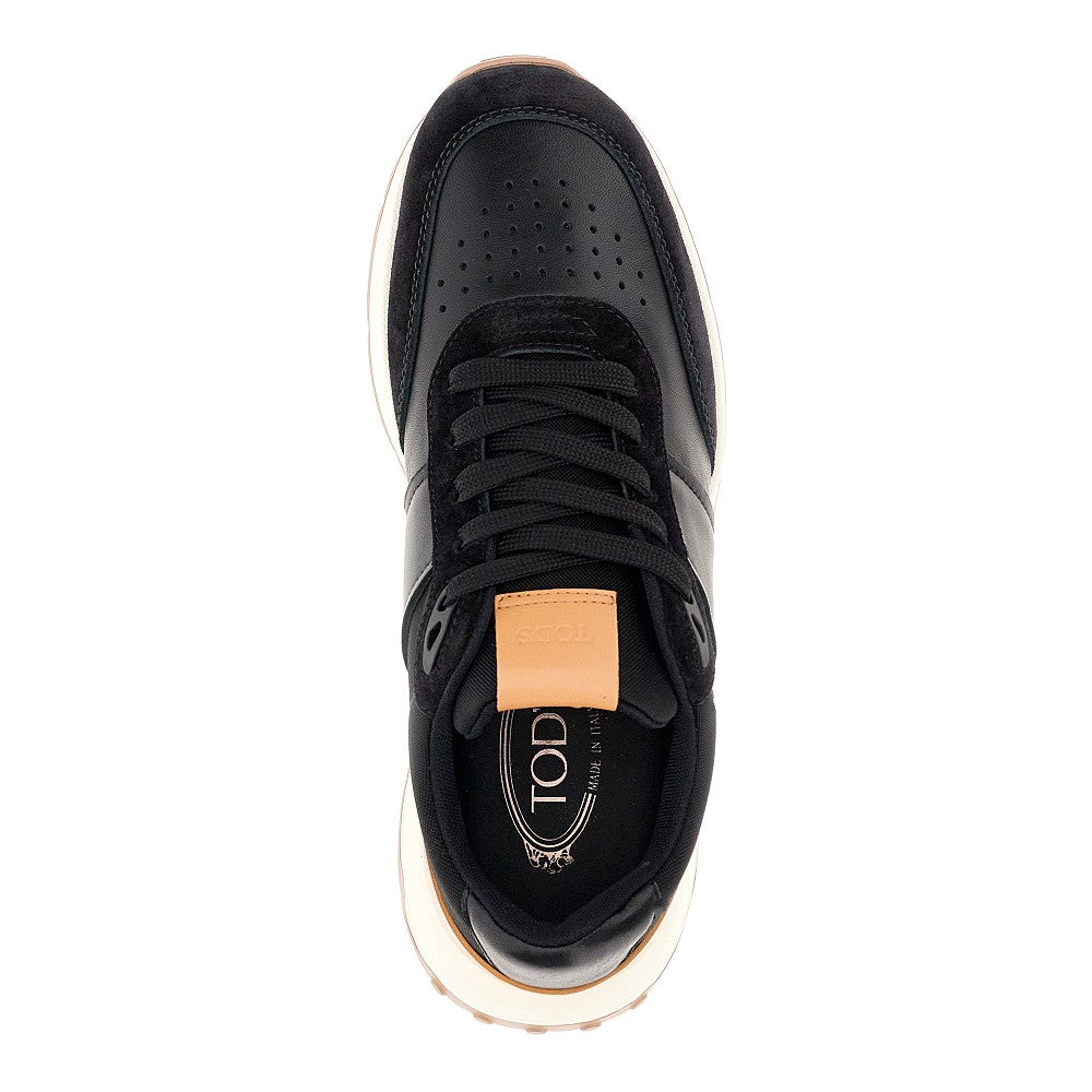 Sneakers in pelle e tessuto tecnico