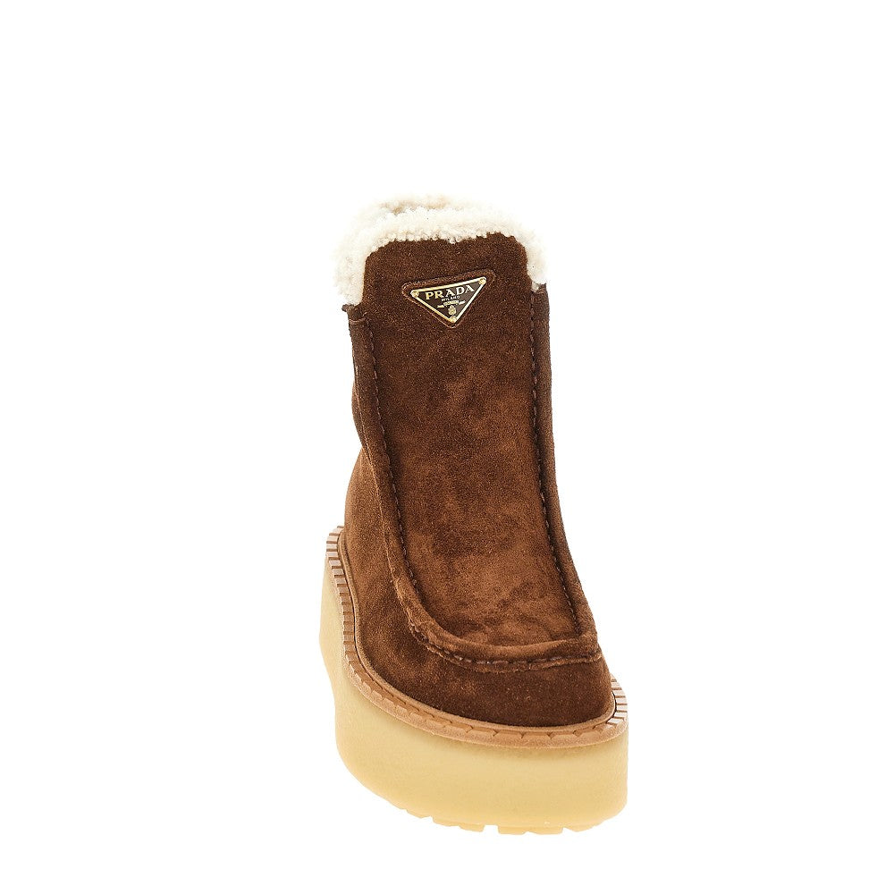 Stivaletti in pelle scamosciata e shearling