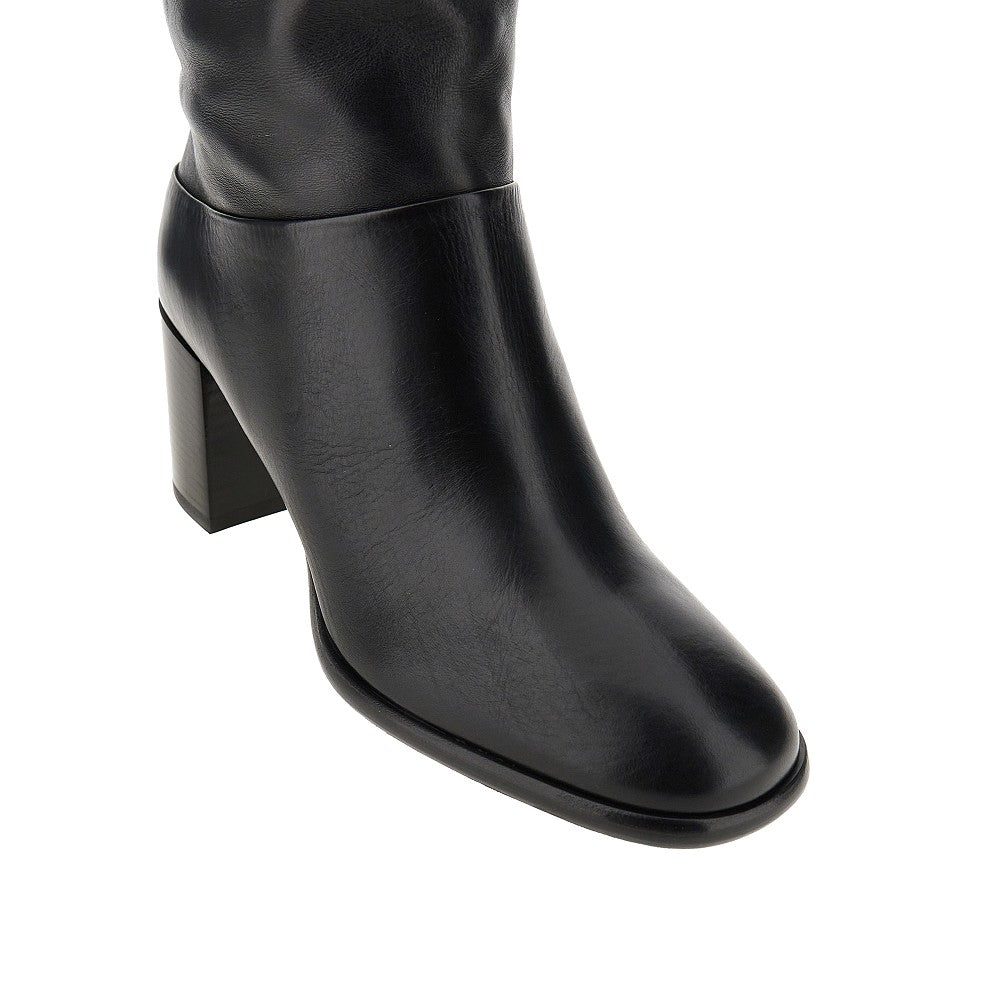 Leather boots with triangle logo