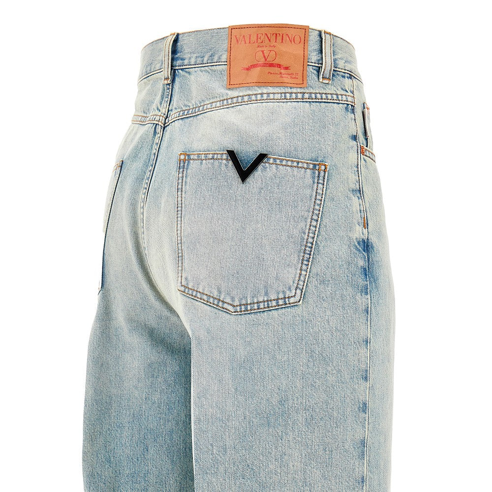 Jeans a gamba ampia con dettaglio V